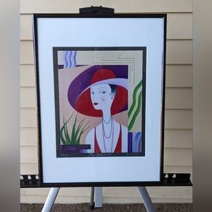 Framed print of "That Lady in Red" numbered and signed by D'Arrigp